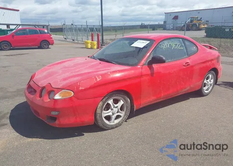 2001 Hyundai Tiburon Base Pkg 1 2 z USA, uszkodzony, nr VIN KMHJG25F71U226180